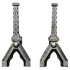 Pair of Polished Cast Iron Andirons of Symmetrical Form
