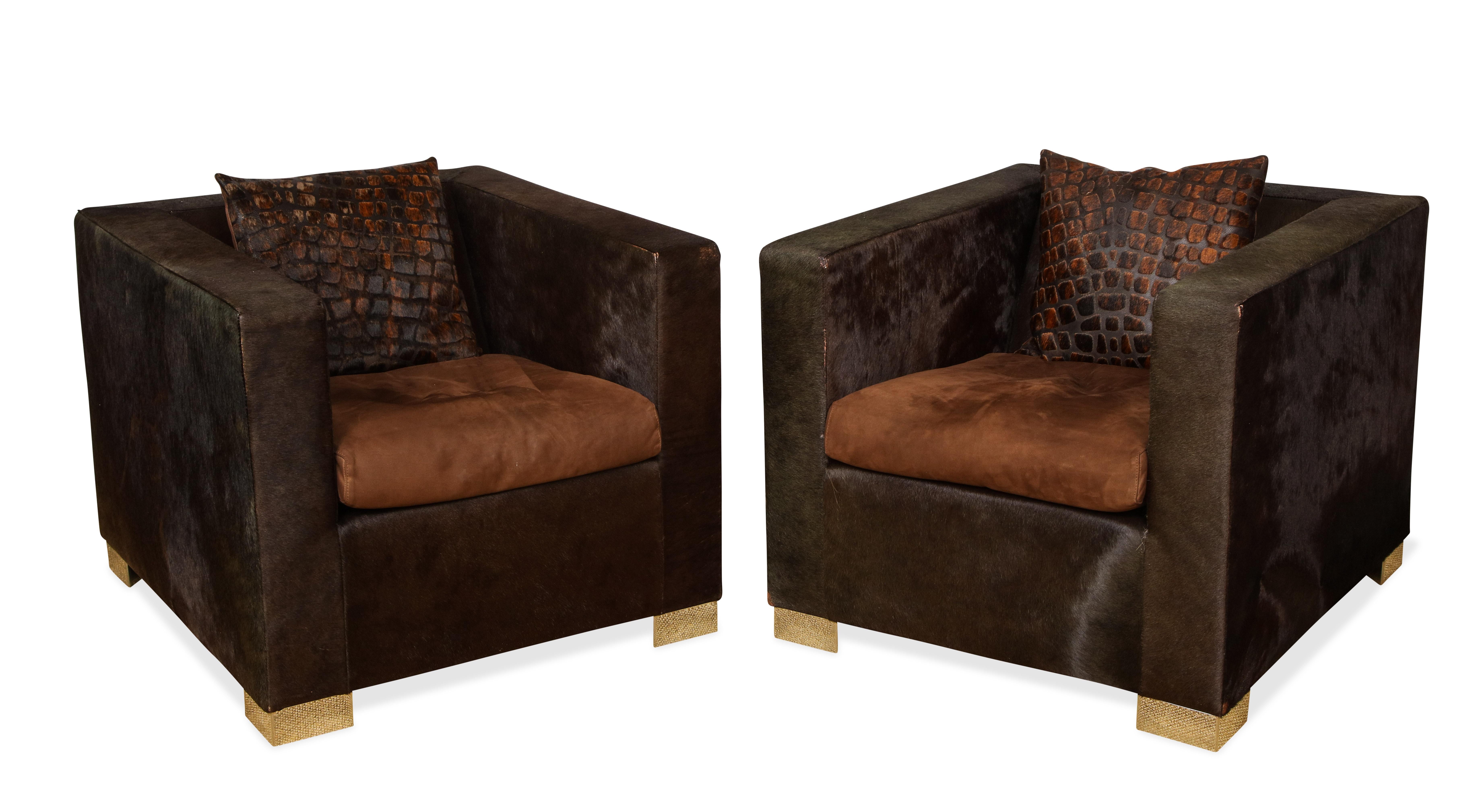 Pair of clean-line club chairs in chocolate brown pony with feet in polished steel by Minotti, Italy, 1990s.
 