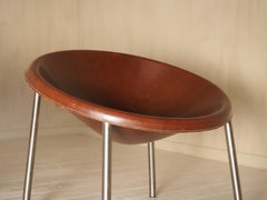 Un par de butacas "Poppea" de Arte & Cuoio por Enrico Tonucci