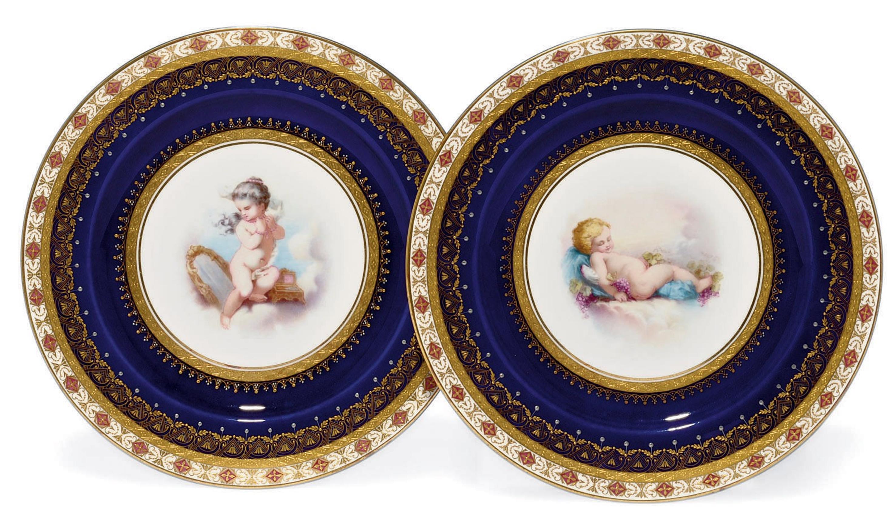 A very decorative pair of porcelain plates depicting Putto at Play, by Minton. 

English, dated 1881. 

Impressed Marks for Minton and year Cypher for 1881.

Each plate is finely painted in the manner of Thomas Kirkby, with putto figures to