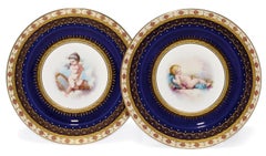 Pair of Porcelain Plates Depicting Putto at Play by Minton, Dated 1881
