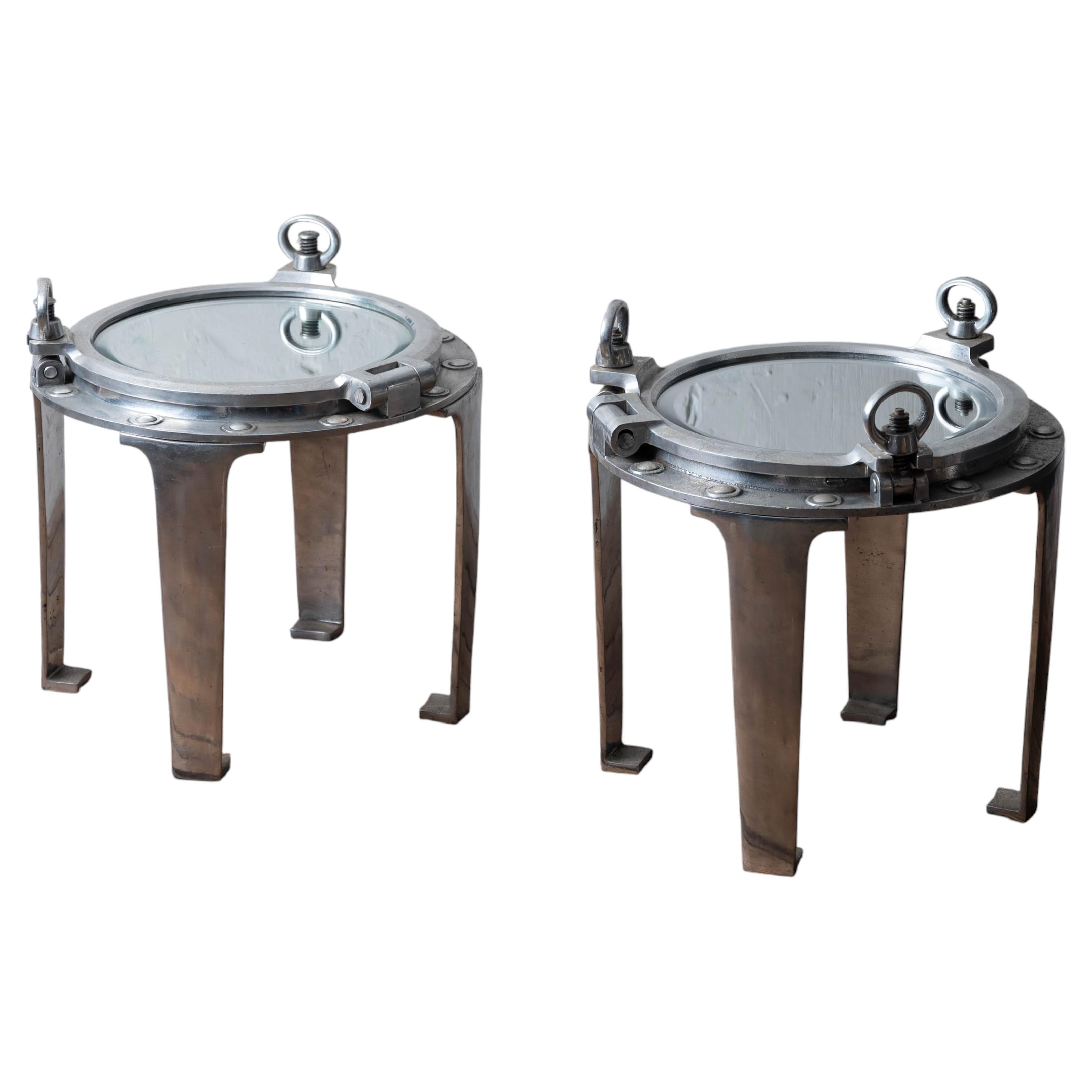A Pair of Porthole Cover Side Tables For Sale