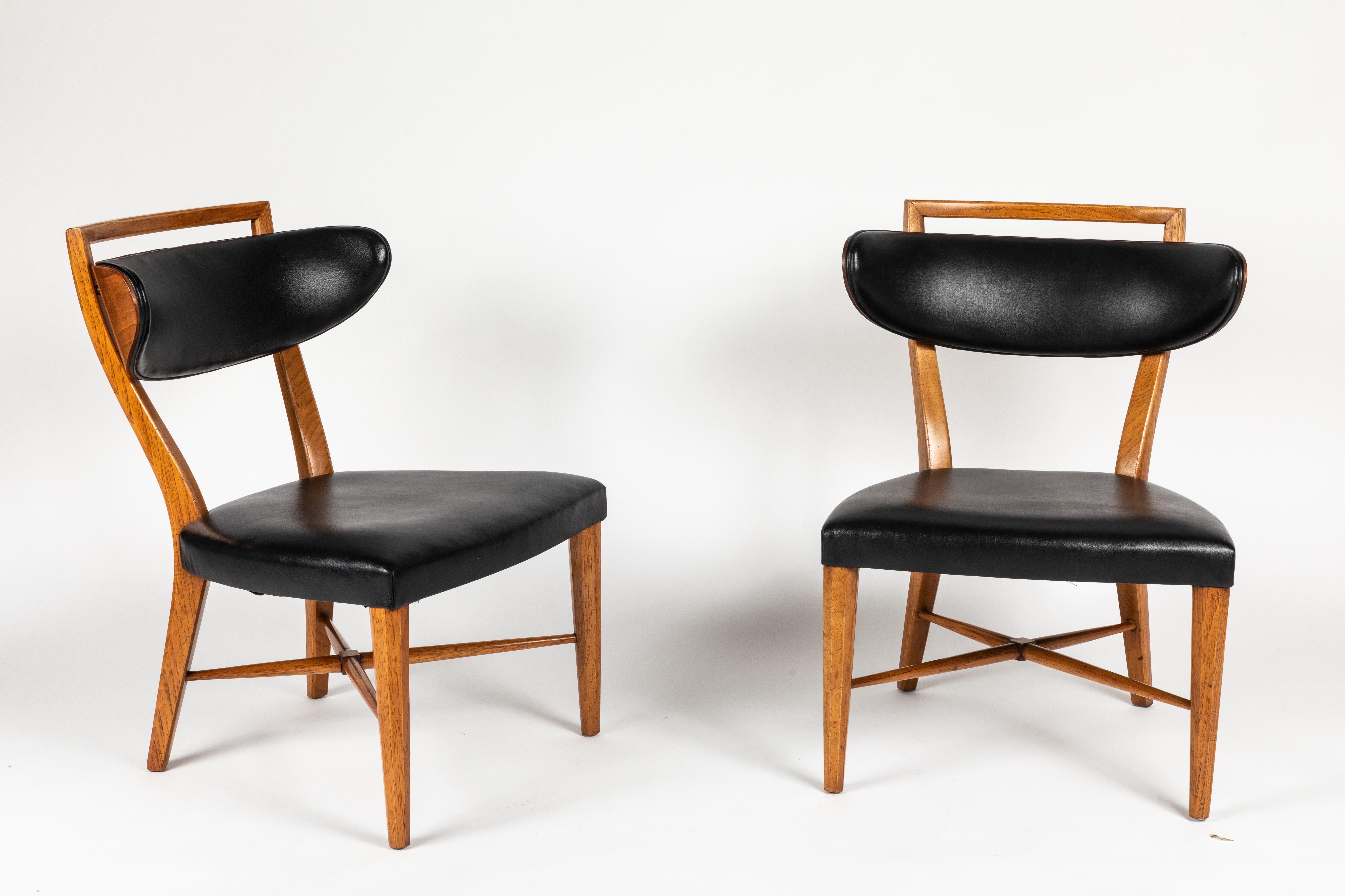 A chic and useful pair of pull up chairs in original upholstery and finish ready to be customized by you, or used as is.
Very much in the style of designers like Billy Haines these chairs have style to spare. Original finish in Fine condition.
 