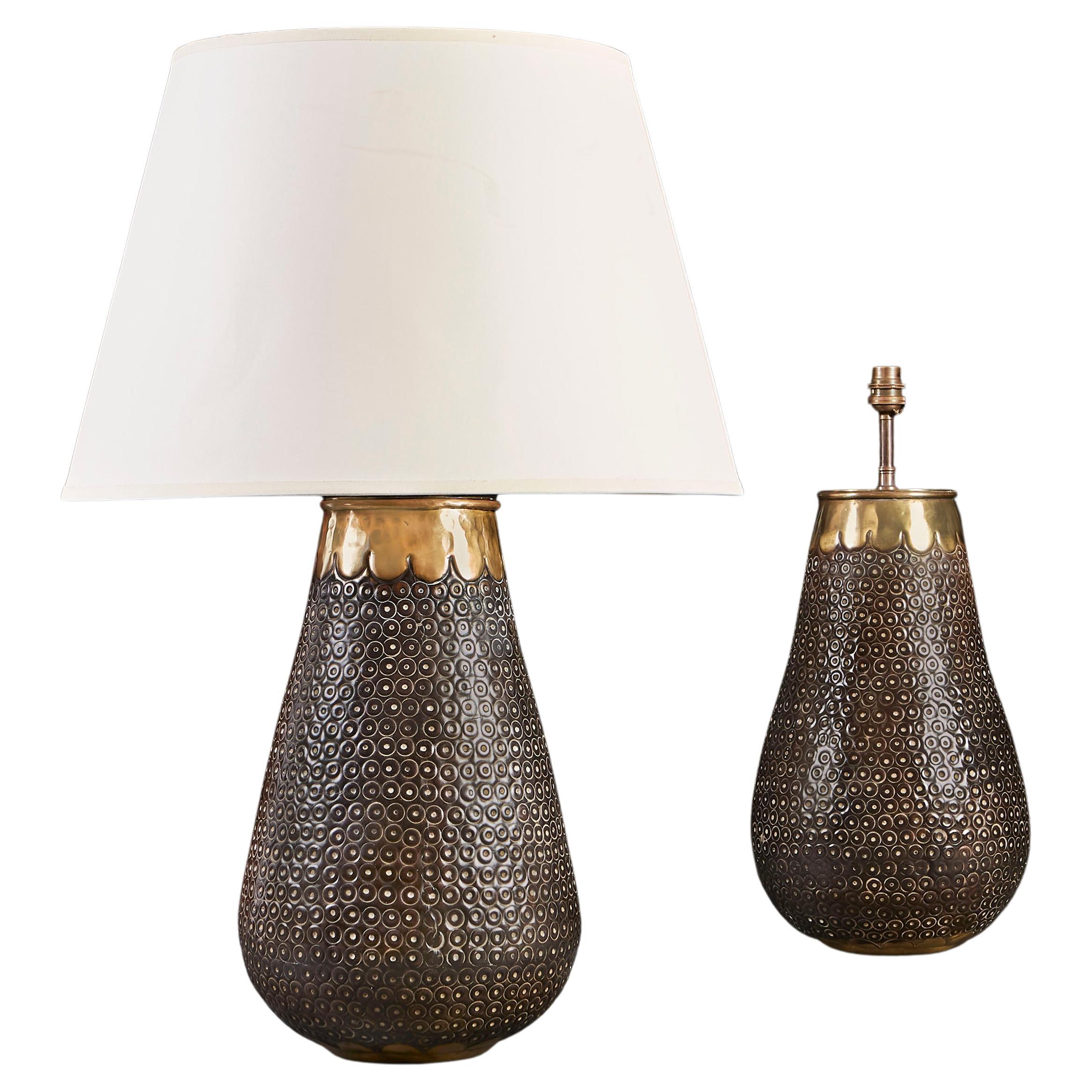 A Pair of Punched Metal Lamps with Brass Scallop Rims For Sale