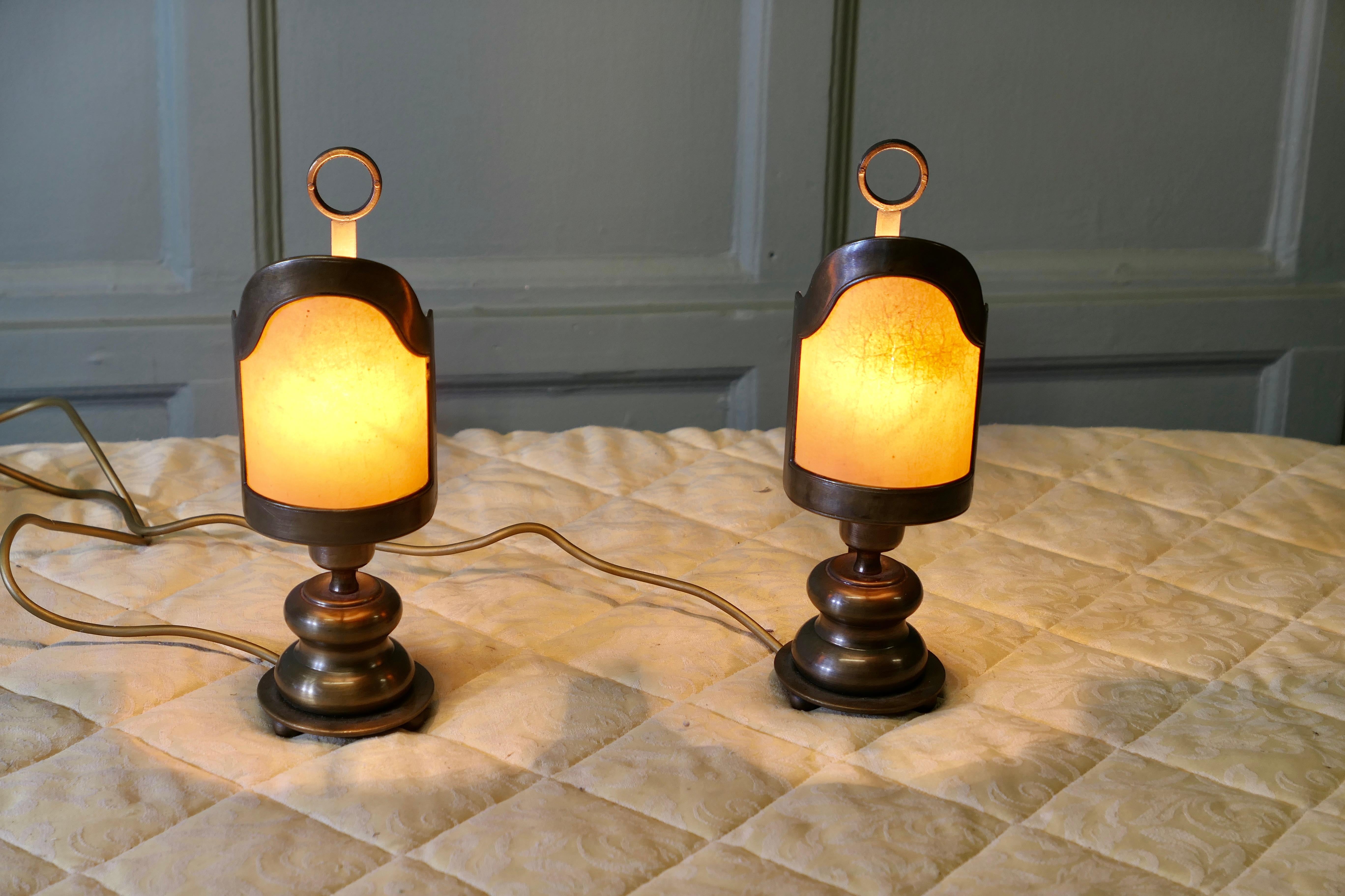 A Pair of Railway Look Bedside Lamps

This is a very unusual pair of lights they are made in brass with wooden a base and designed like a 19th century candle lamp with a carrying handle and parchment shade

The lights are in good vintage condition,