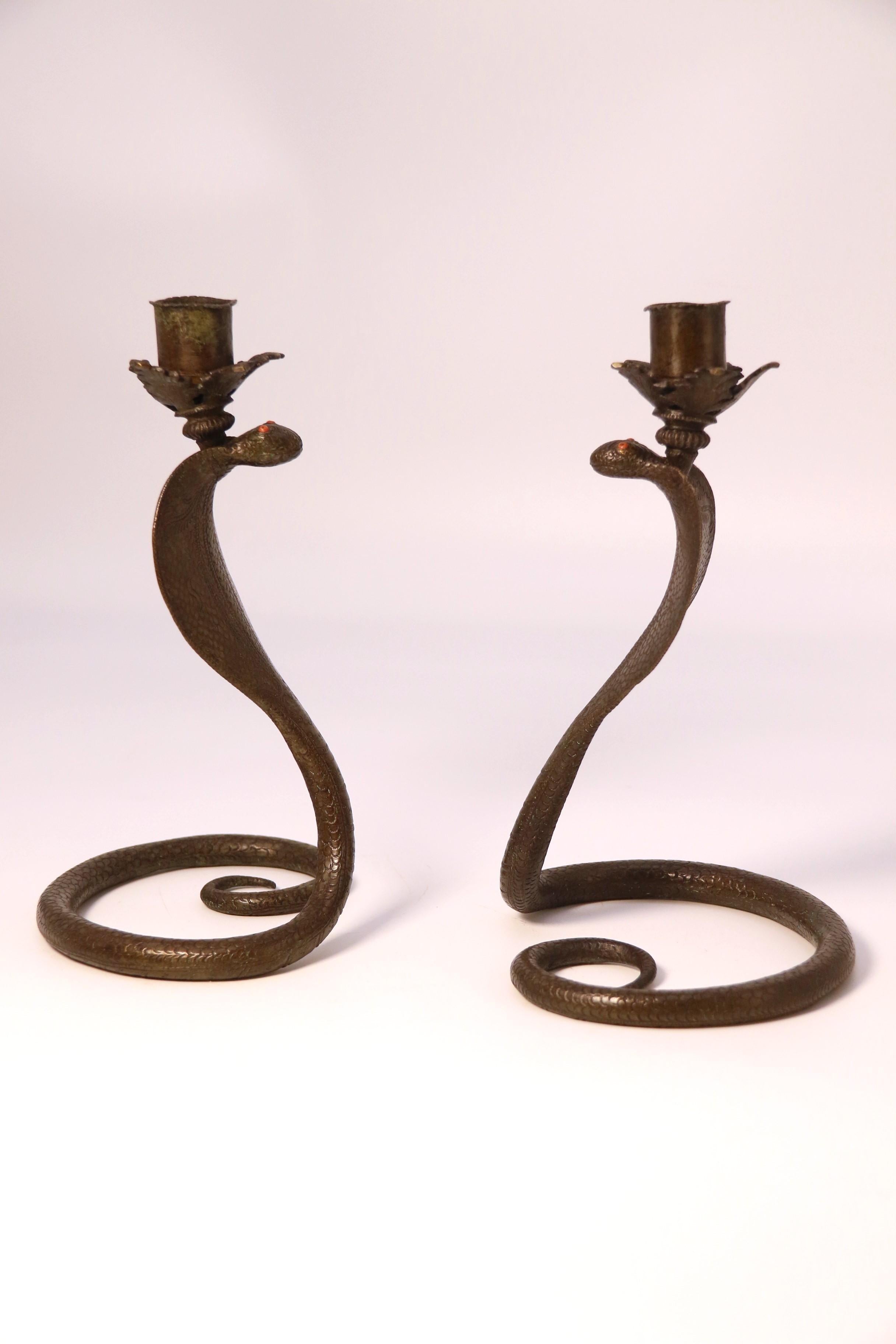 A pair of Raj period Indian bronze candlesticks in the form of striking cobras In Good Condition In Central England, GB