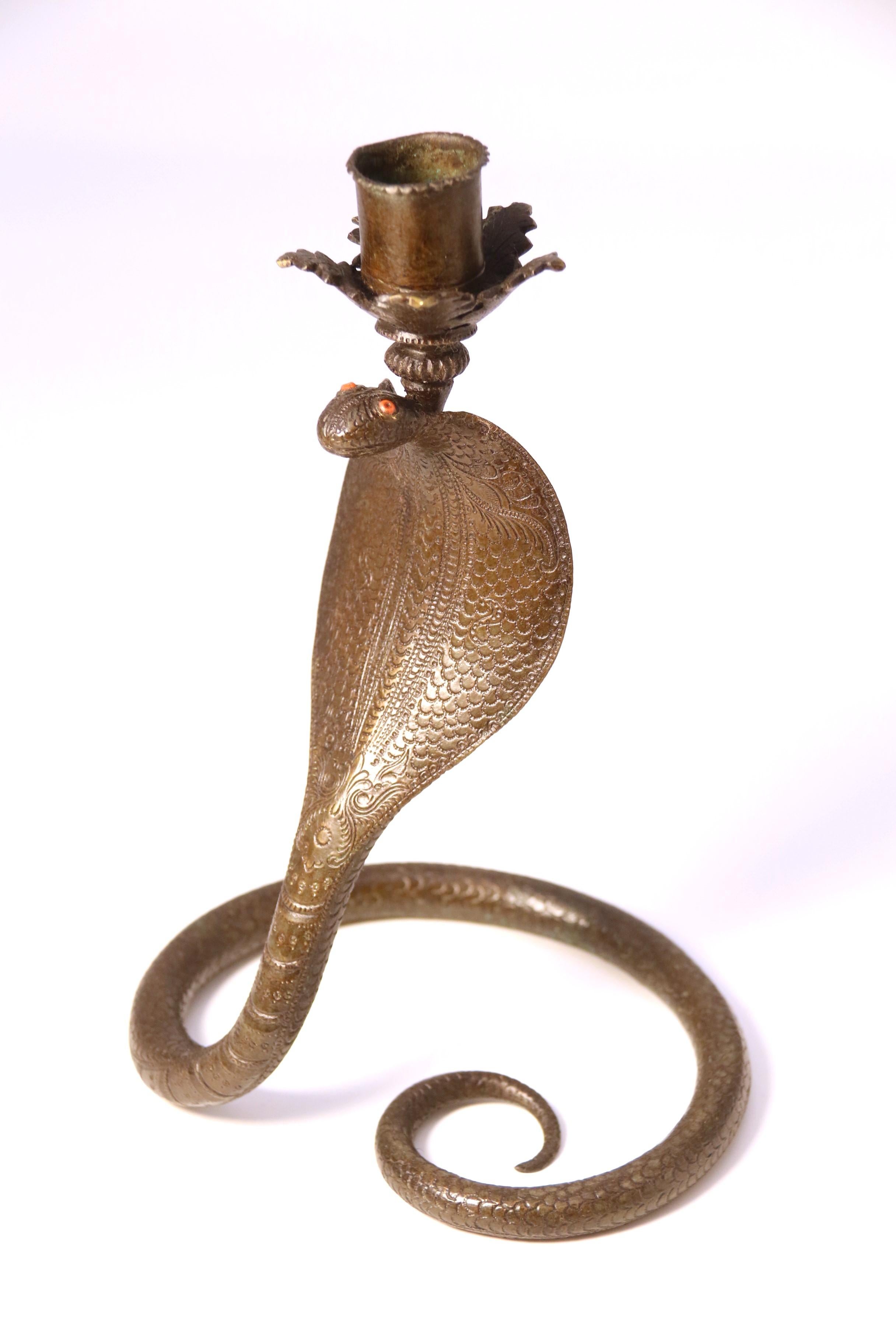 A pair of Raj period Indian bronze candlesticks in the form of striking cobras 2