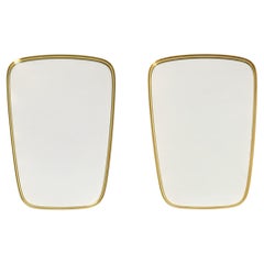 A pair of rare original Mid Century Modern "Münchener Zierspiegel" wall mirrors