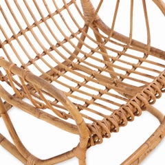 A Pair of Rattan Lounge Chairs Attributed to Tito Agnoli.
