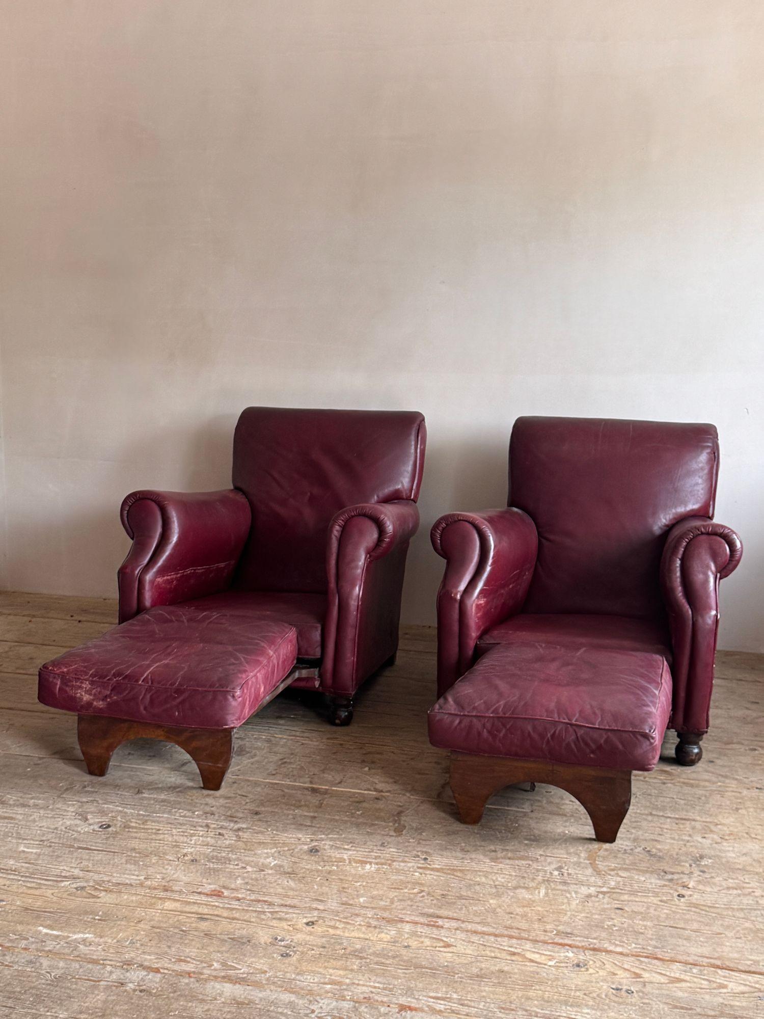 Leather A pair of red leather club chairs For Sale