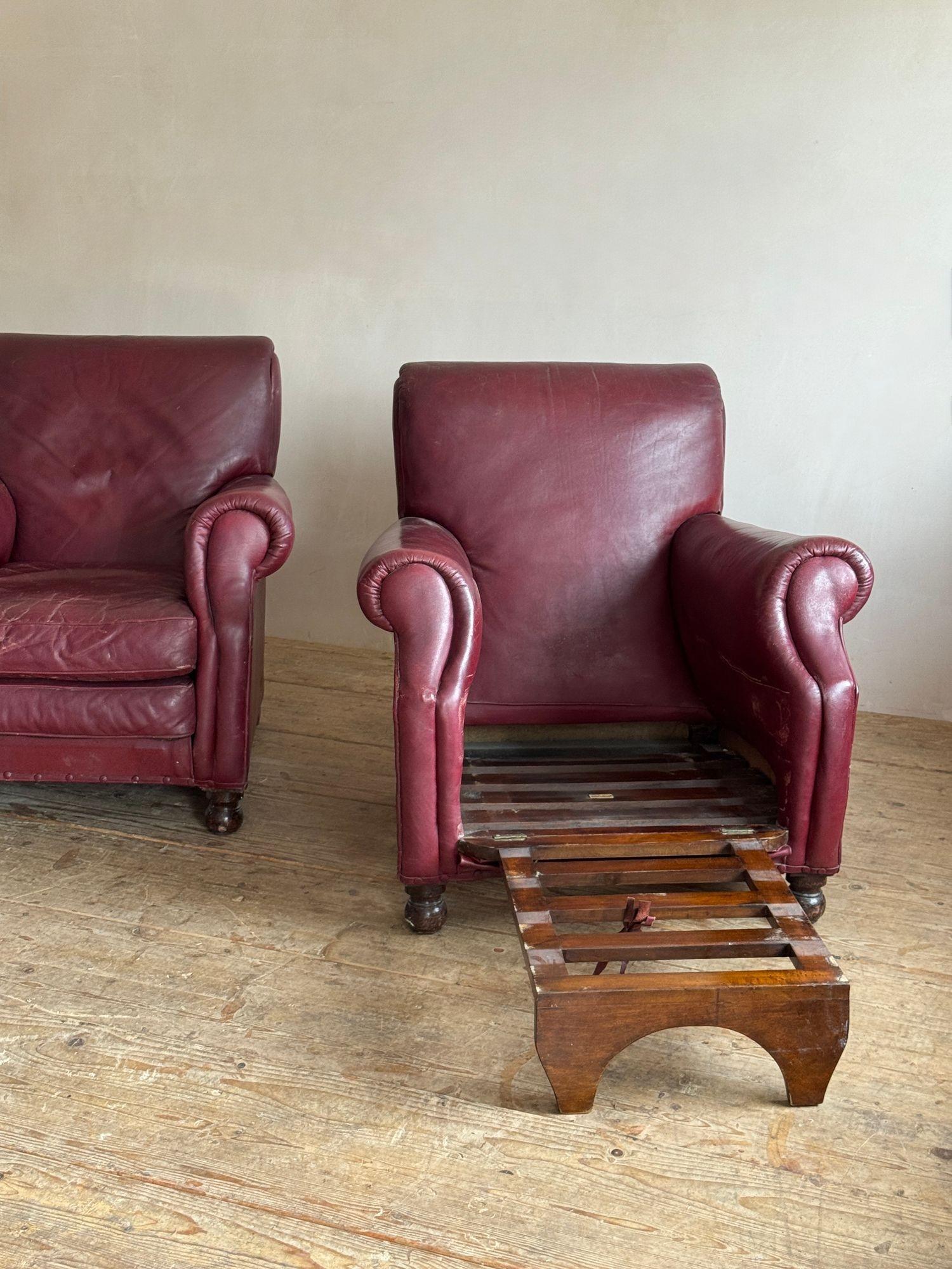 A pair of red leather club chairs For Sale 1