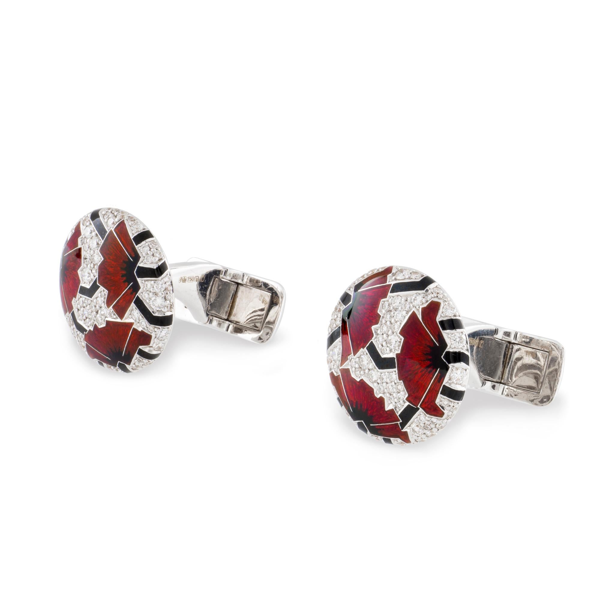A pair of red poppies art-deco style cufflinks by Ilgiz F, each cufflink with three poppies with champlevé enamelled petals and hot enamelled peduncles, on a diamond pave-set background of round shape, the diamonds weighing 2.28 carats in total, all