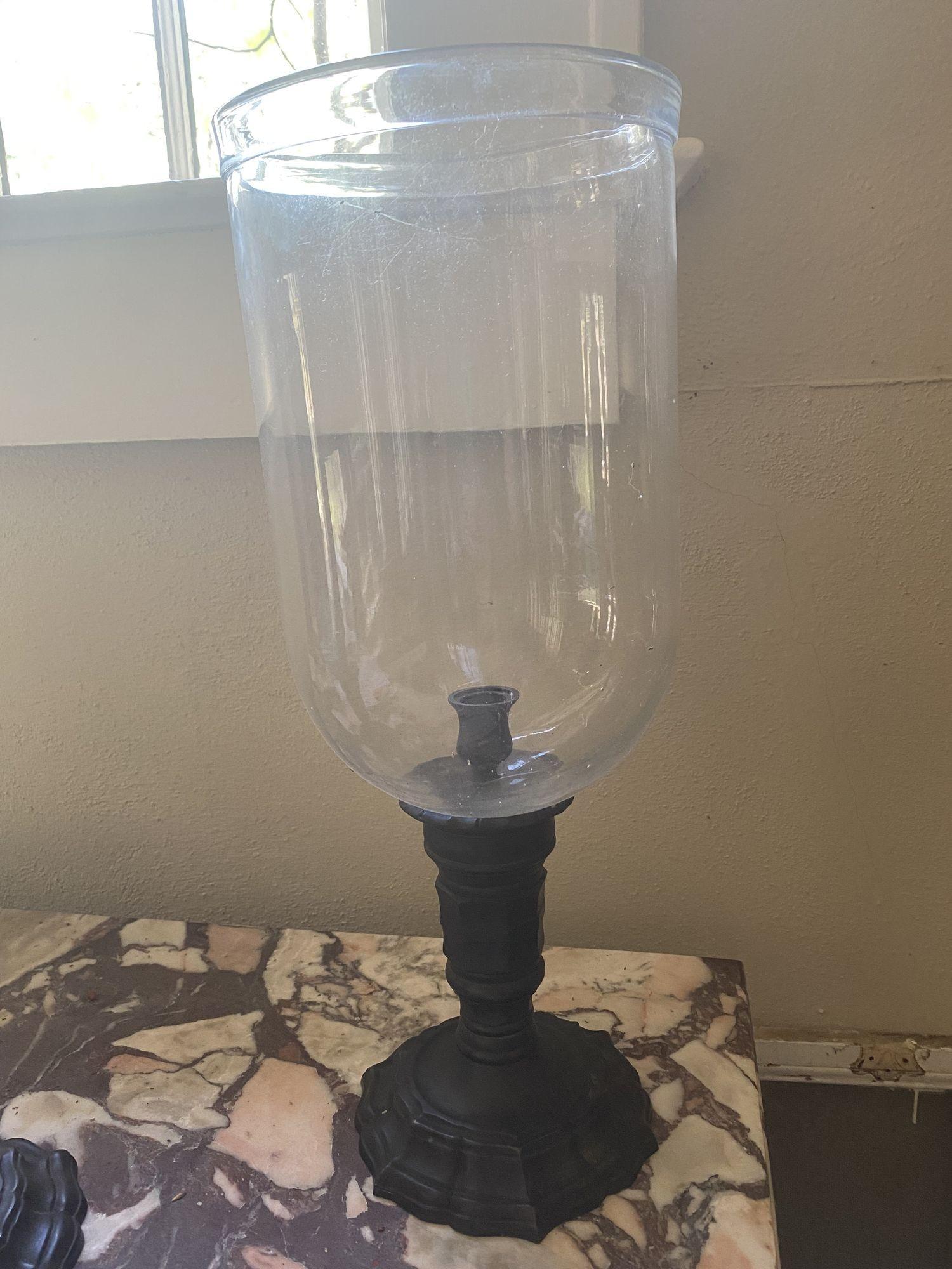 The dark brown bronze bases with scalloped edges with hand blown glass shades.  H. 18