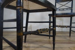 Pair of Regency 19th Century Ebonized and Caned Side Chairs