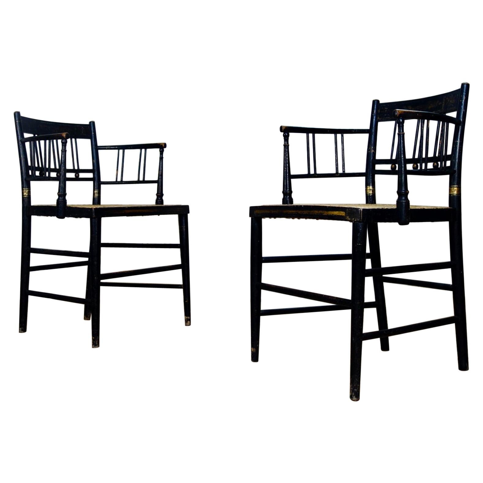 A Pair of Regency 19th Century Ebonized Gilded Open Armchairs - Chair, Caned