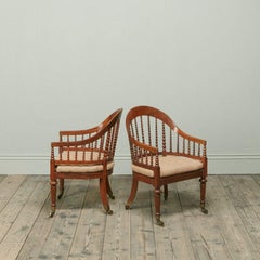 Pair of Regency Faded Rosewood Library Armchairs