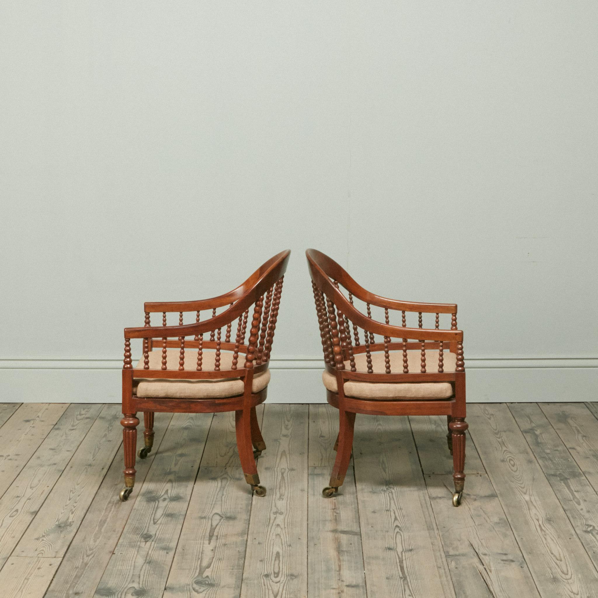 British Pair of Regency Faded Rosewood Library Armchairs