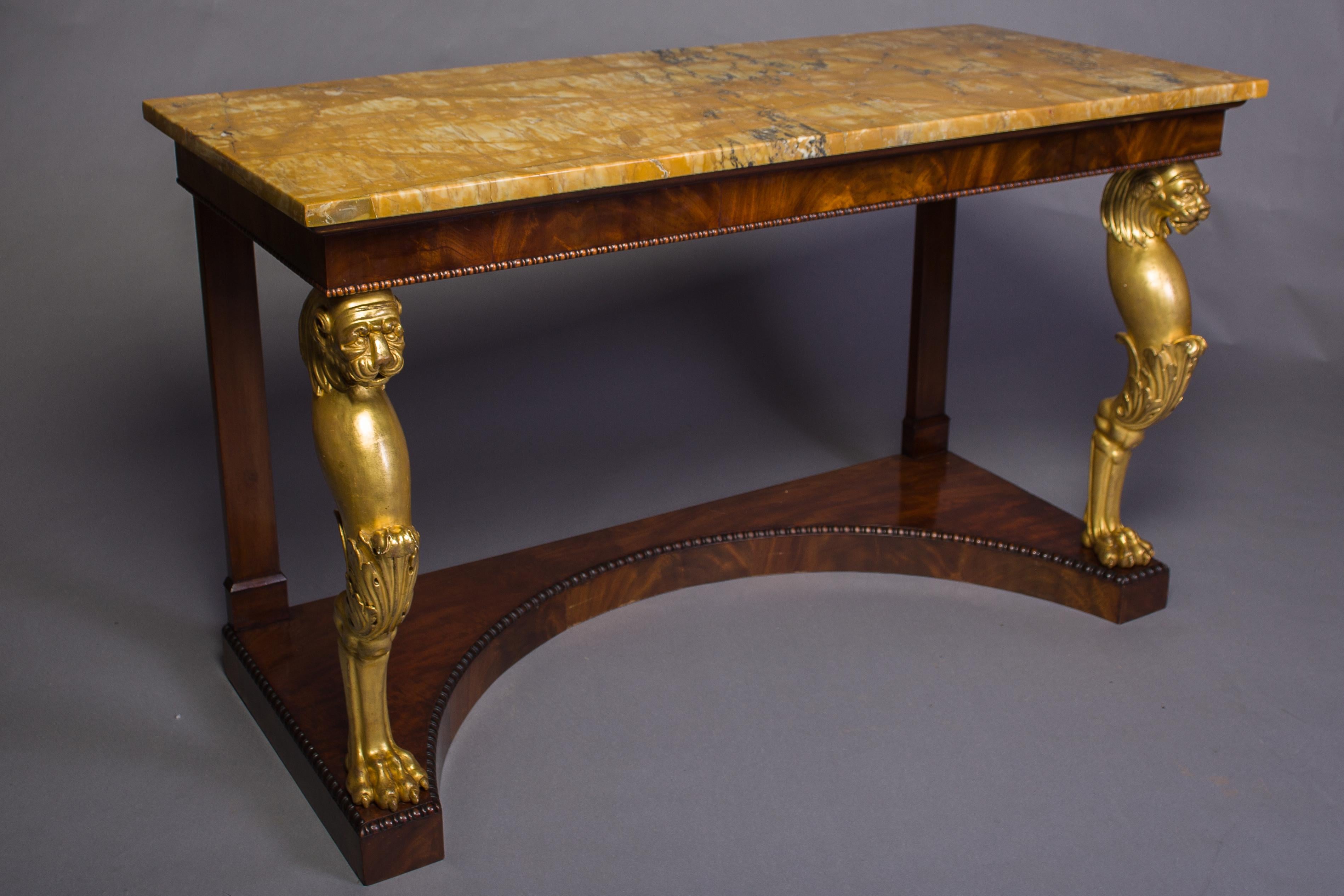 English Pair of Regency Giltwood and Mahogany Console Tables For Sale