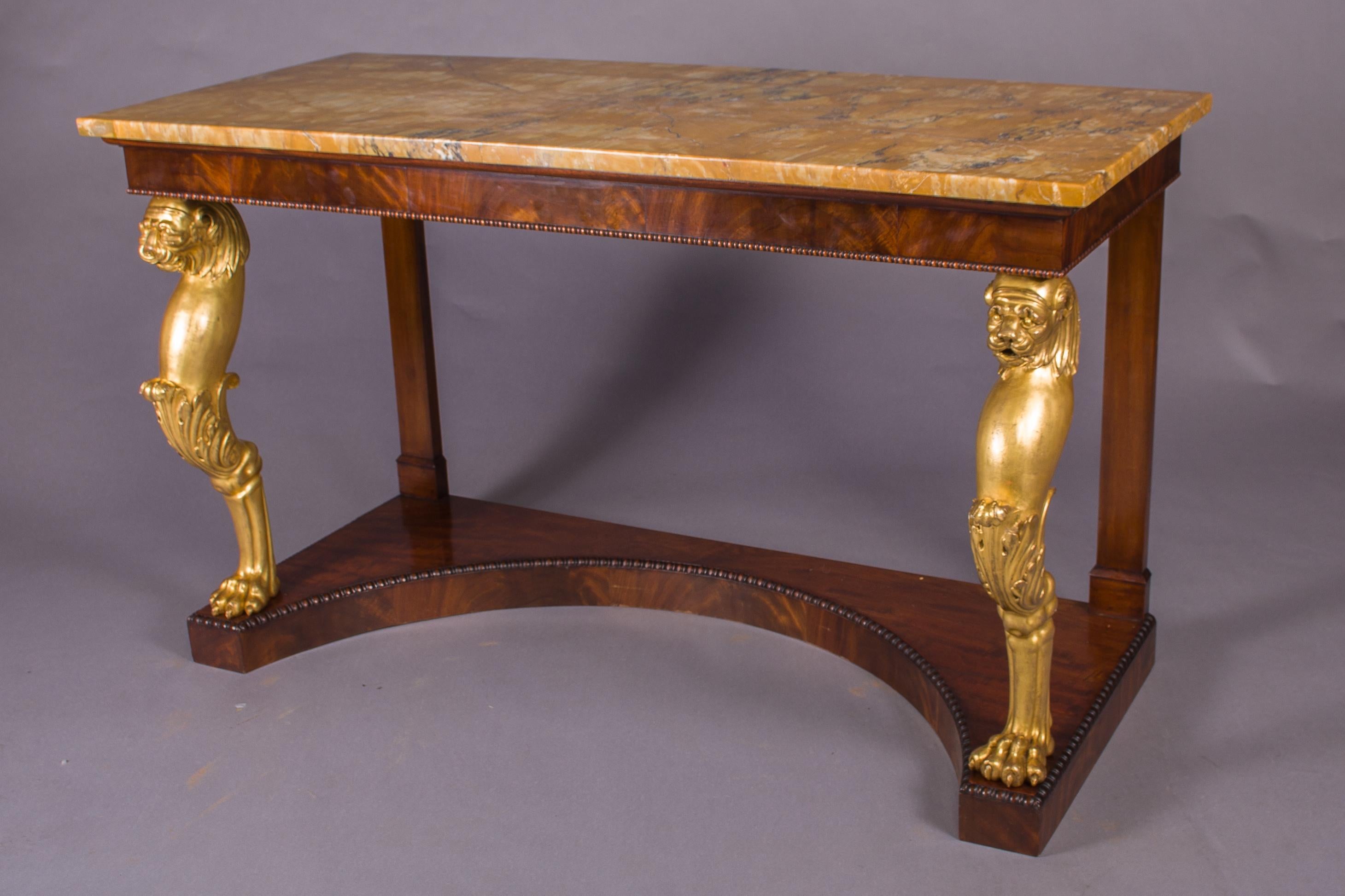 Carved Pair of Regency Giltwood and Mahogany Console Tables For Sale