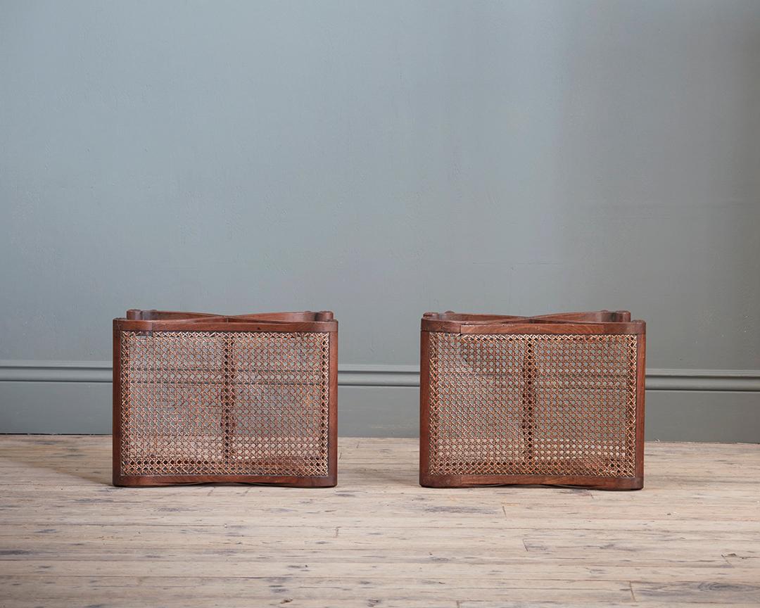 English A Pair of Regency Mahogany and Caned ‘X’ Framed Stools