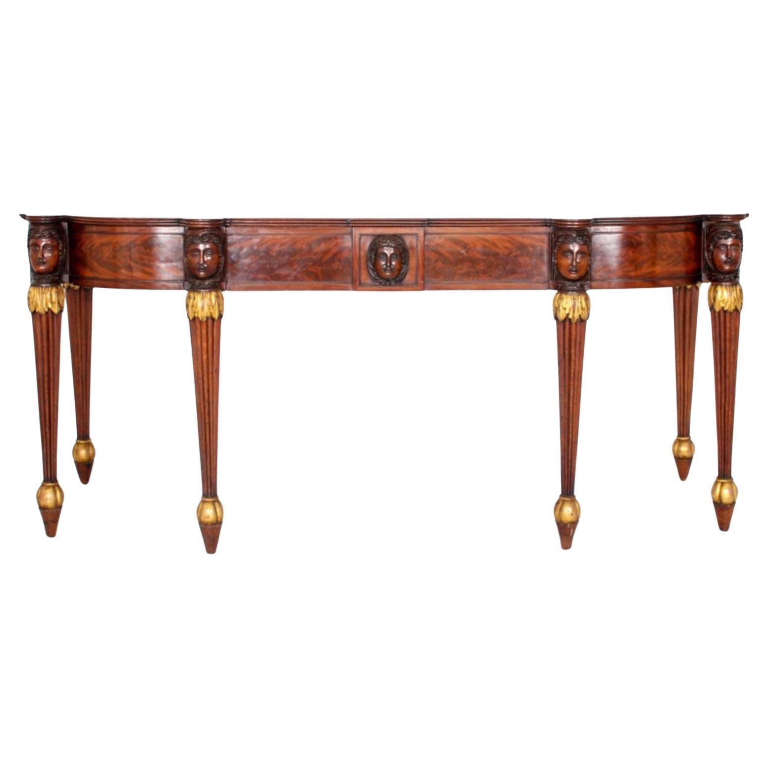 A Pair of Regency Mahogany and Parcel Gilt Serving Tables For Sale