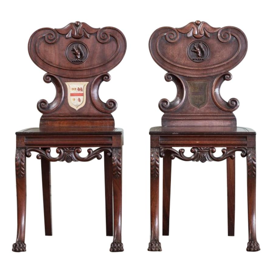 Pair of Regency Mahogany Armorial Hall Chairs, with Unusual Carved Squirrels