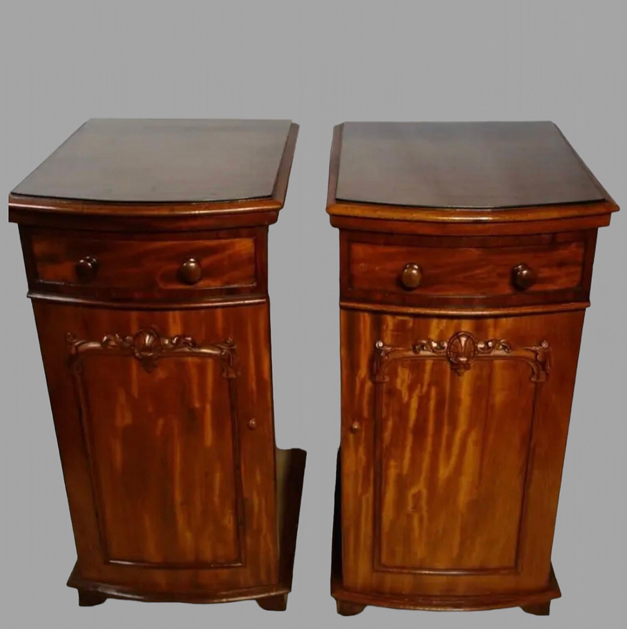 A Pair of Regency Mahogany Pedestal/Bedside Cabinets each with a drawer and a cupboard revealing two sliding shelves. Both have had glass tops made for them. A great pair.