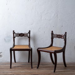 A Pair of Regency Mahogany Cane Chairs, c.1810