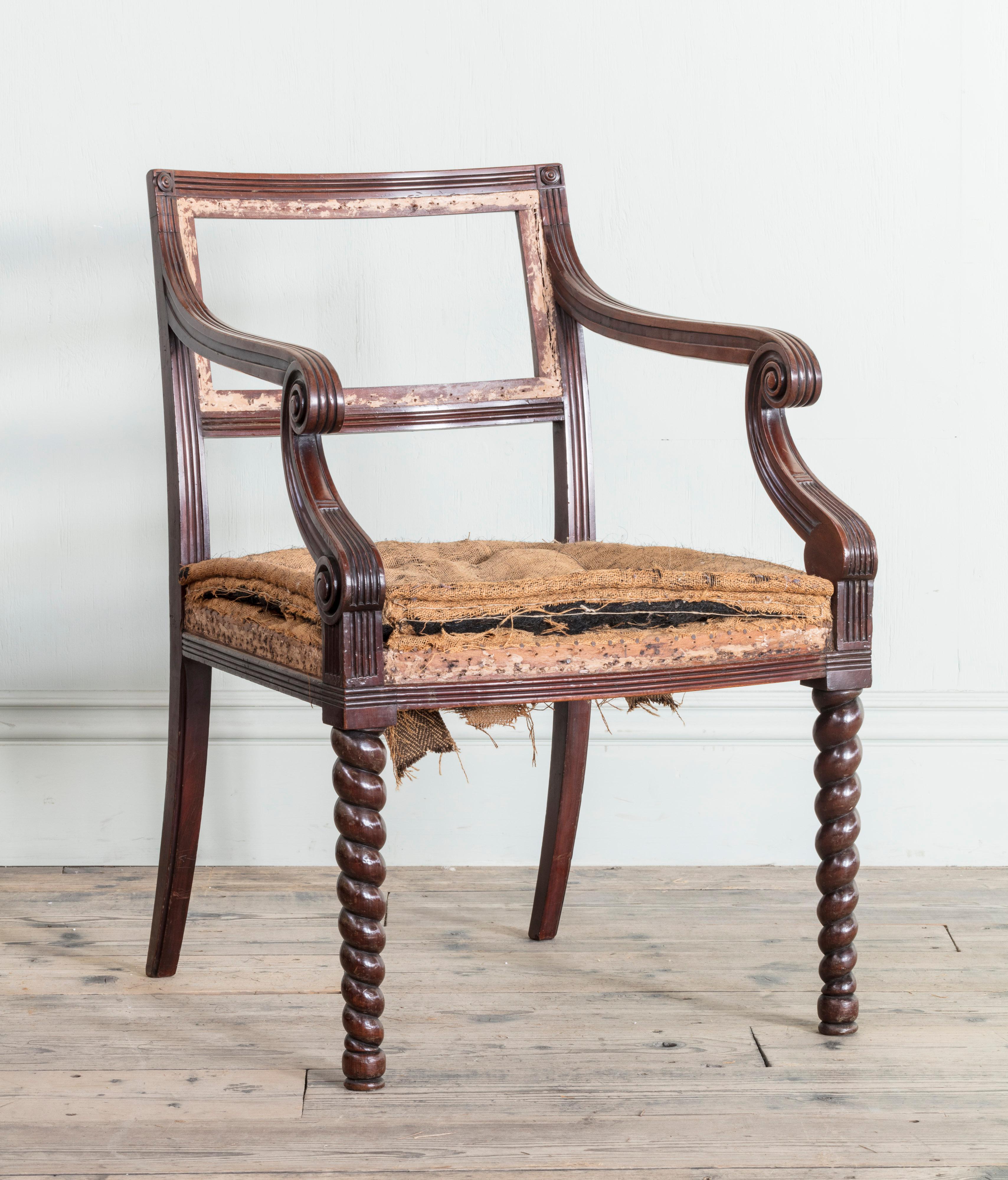 A pair of Regency mahogany side chairs.