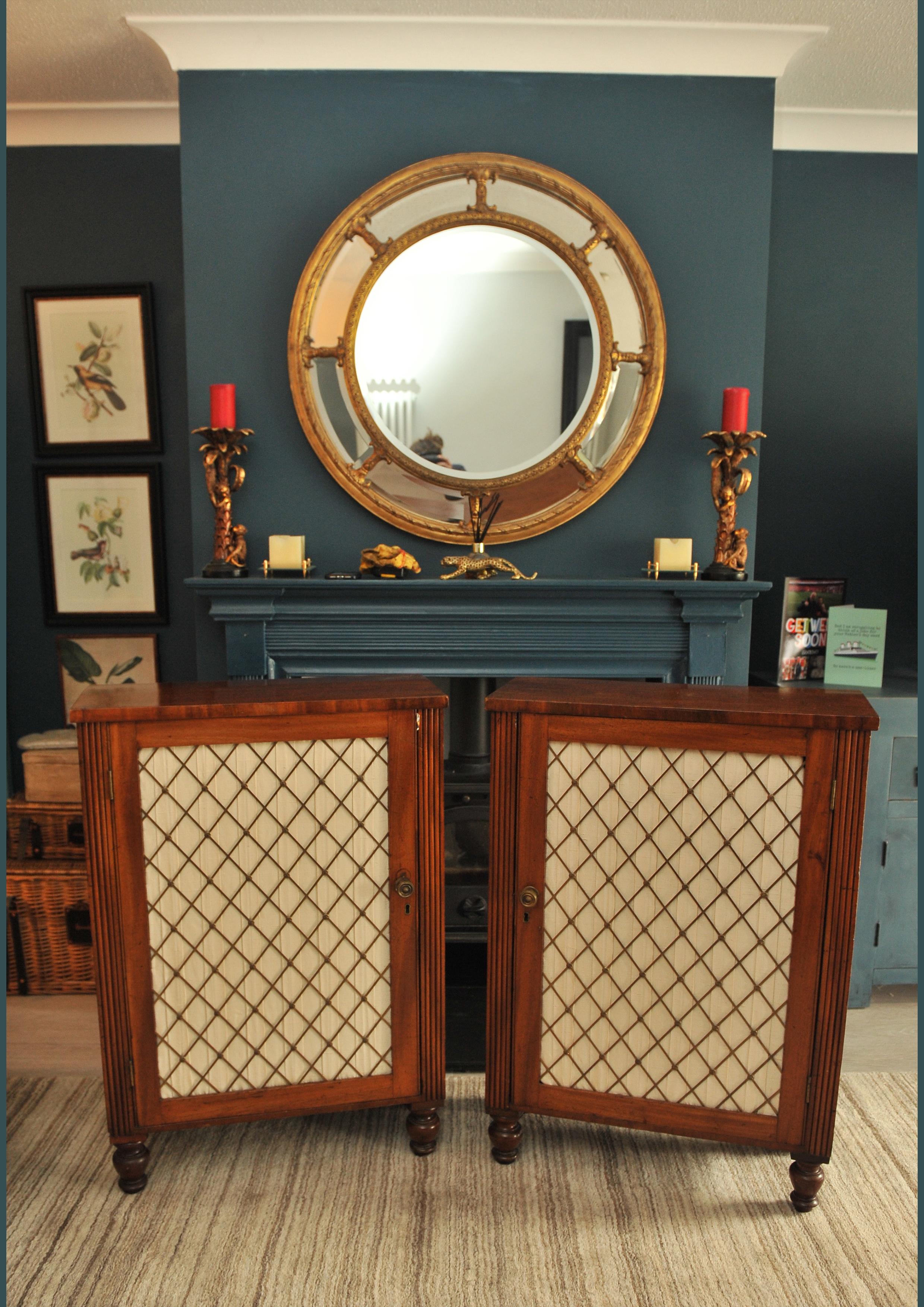 Rare Pair of Exquisite Regency Period Mahogany Side Cabinets with Decorative Brass Lattice Fronts

Internal measurements 
Depth of shelf 24cm
Internal Cabinet Height 77cm