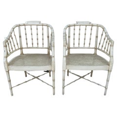 A Pair of Regency Style Faux Bamboo And Cane Armchairs