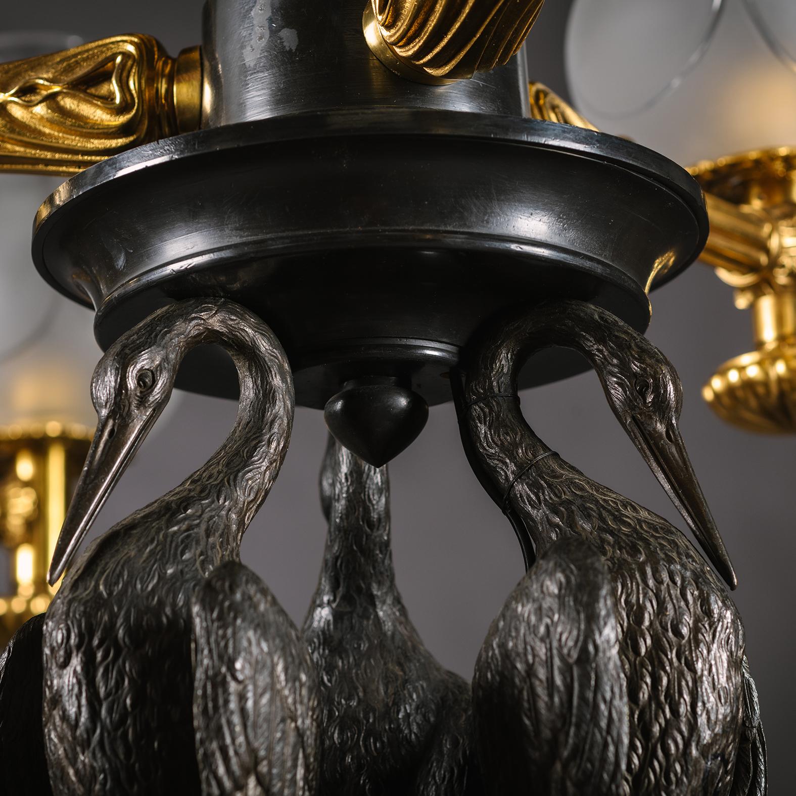 English A Pair of Regency Style Gilt and Patinated Bronze Floor Lamps or 'Torchères' For Sale
