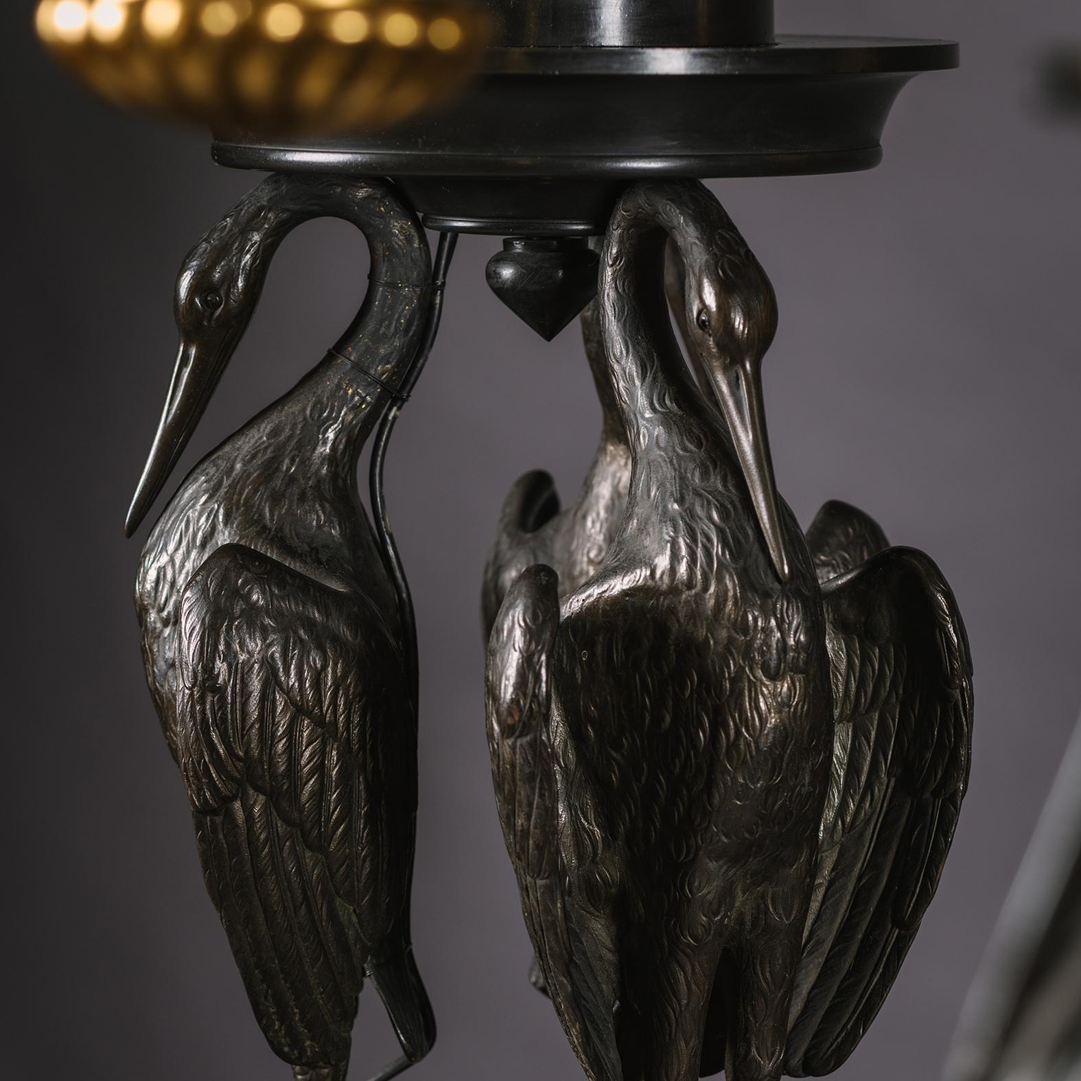 Inglese Coppia di lampade da terra in bronzo dorato e patinato in stile Reggenza o 'torchères' in vendita