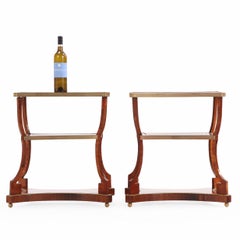 A Pair of Regency style Rosewood, Leather & Bronze Mounted Three-Tier End Tables