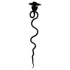 Paire d'appliques de reproduction en forme de serpent, en fer forgé de couleur bronze.