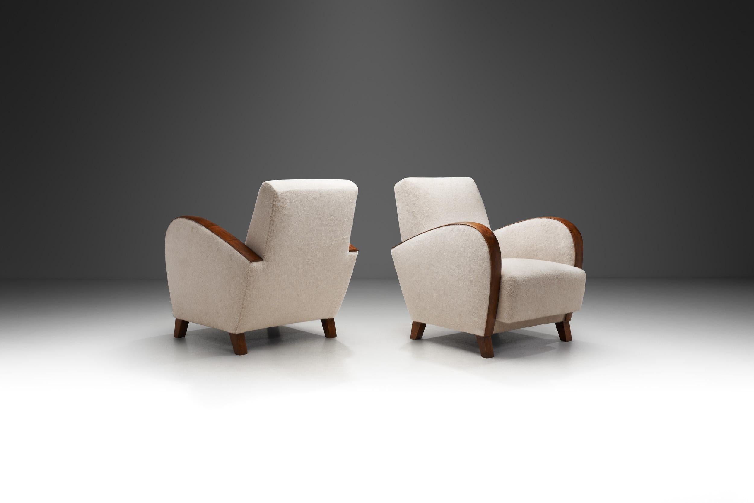 Swedish A Pair of Reupholstered Funkis Armchairs by Axel Einar Hjorth, Sweden 1930s.