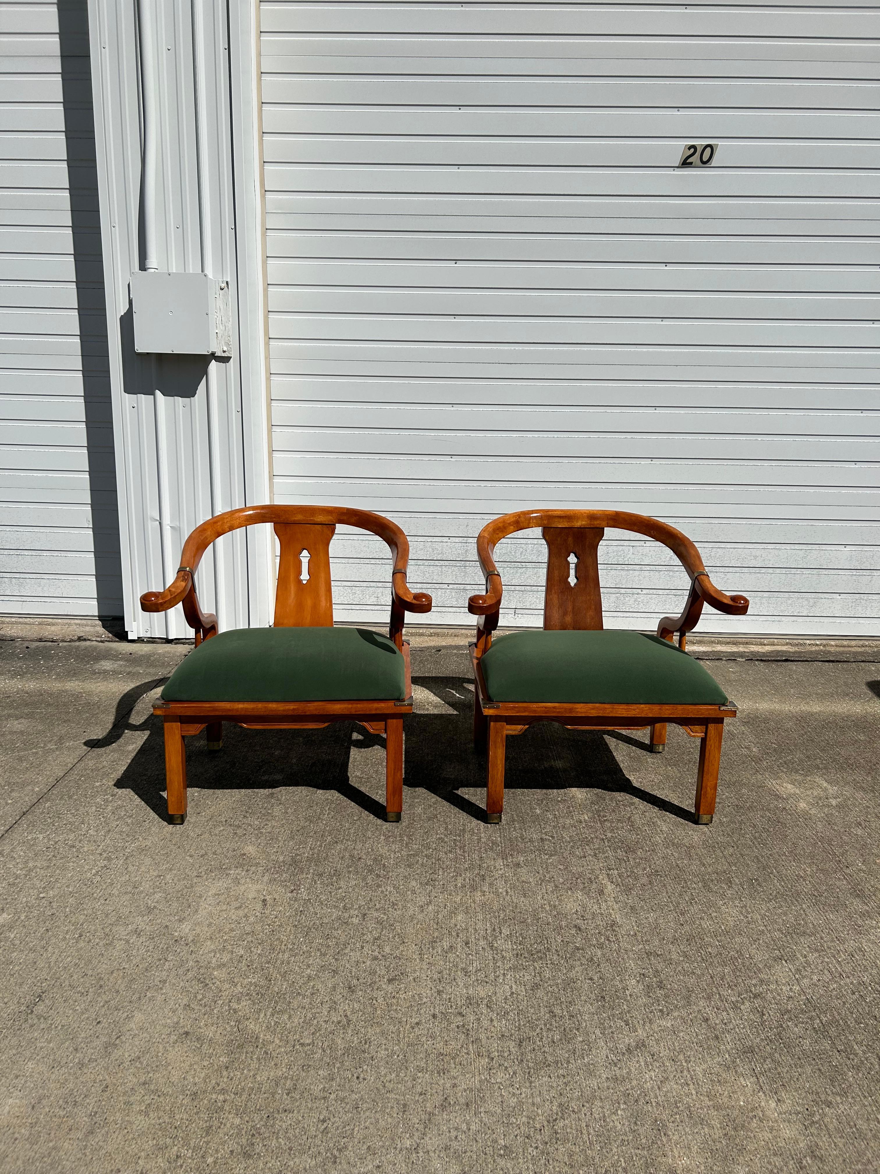 A pair of reupholstered Mid-Century James Mont Style Ming Chinoiserie Accent Chairs. These have been professionally reupholstered in a green velvet fabric by JF Fabrics. The wood has been cleaned and touched up but still holds some imperfections due