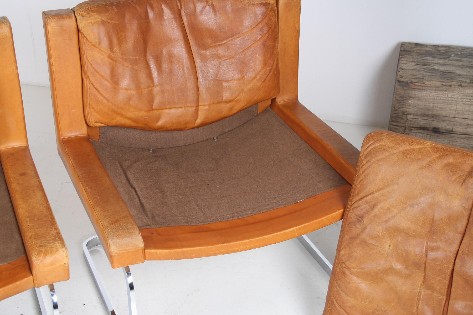 A Pair of Robert Haussmann for De Sede DS-201 Mid Century Tan Leather Chairs For Sale 7