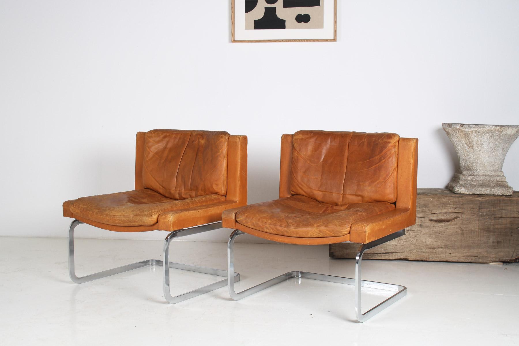 A Pair of Robert Haussmann for De Sede DS-201 Mid Century Tan Leather Chairs For Sale 13