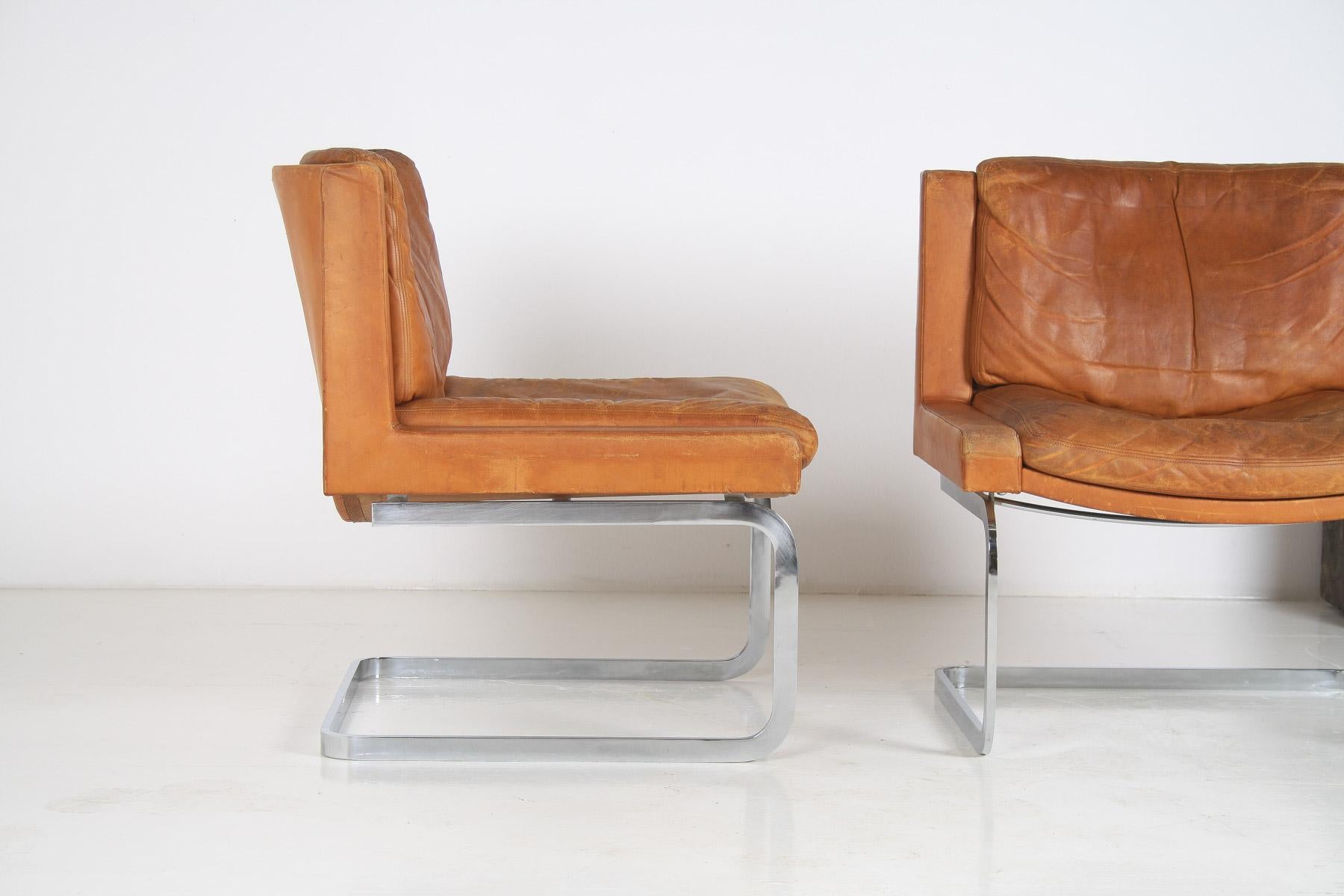 British A Pair of Robert Haussmann for De Sede DS-201 Mid Century Tan Leather Chairs For Sale