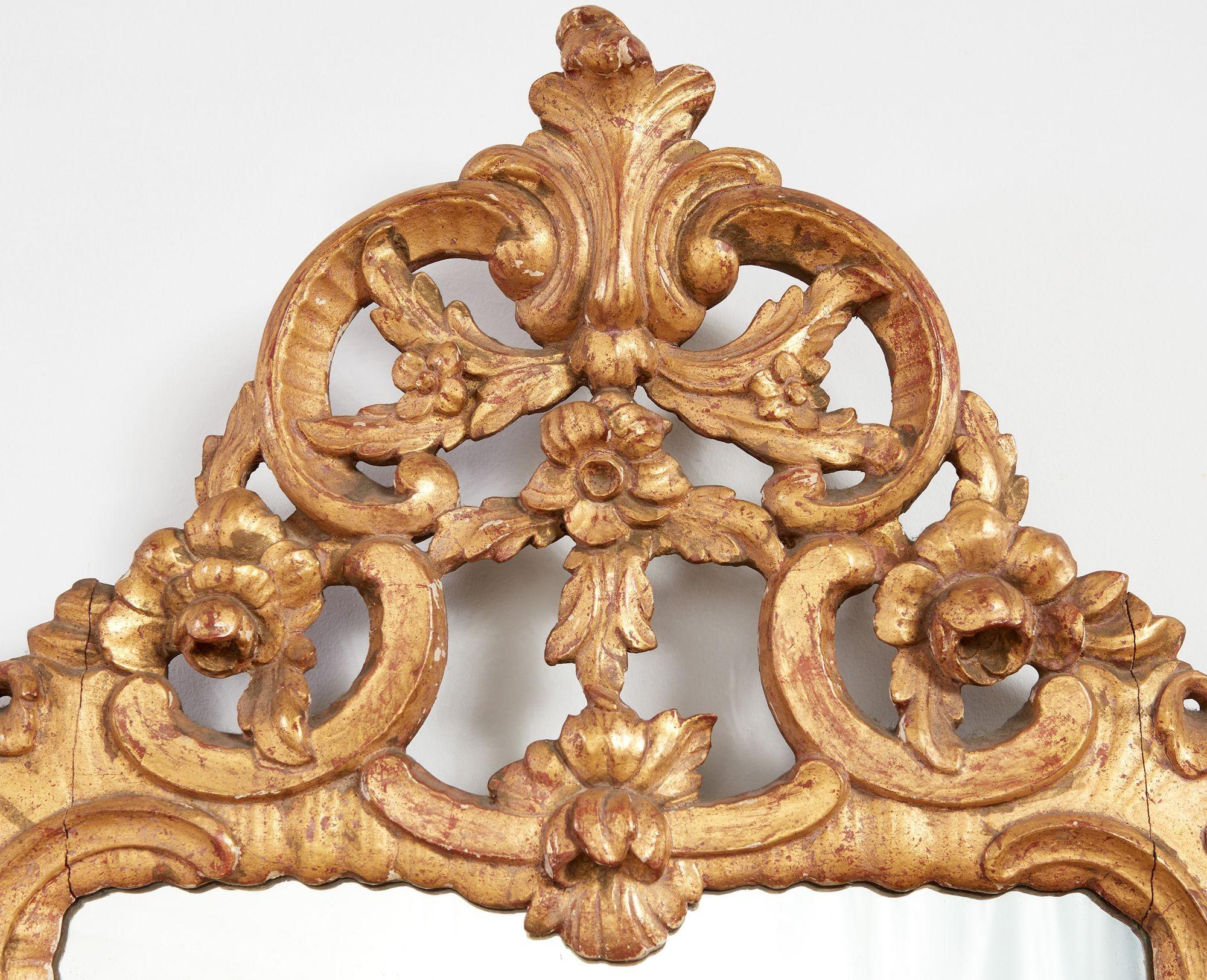 George III A Pair of Rococo Giltwood Mirrors For Sale