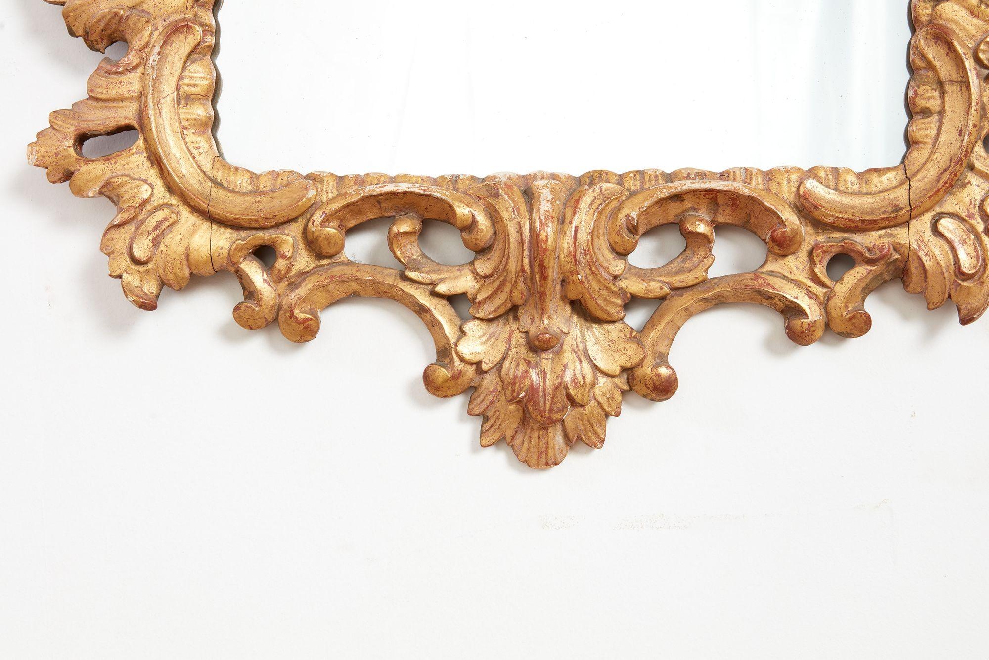 A Pair of Rococo Giltwood Mirrors For Sale 1