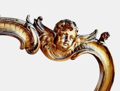 A Pair of Rococo-style, Gilded and Putti-adorned Side Chairs