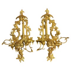 Paire d'appliques murales en bois doré de style rococo, XIXe siècle