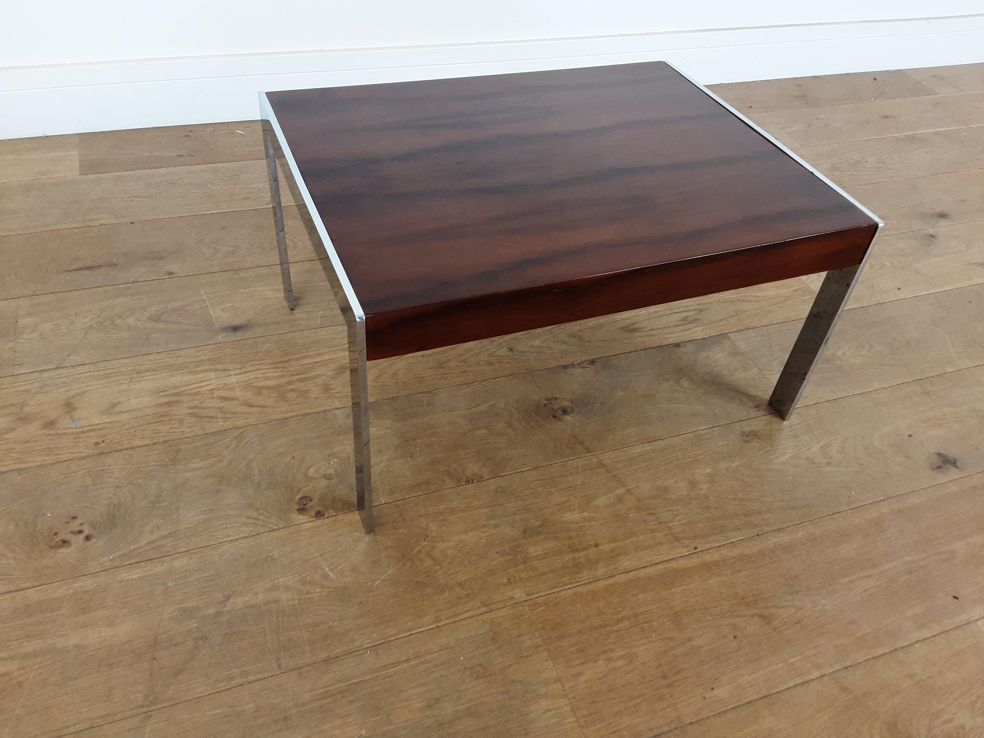 A pair of midcentury tables
Merrow Associates rosewood and chrome tables.
designed by Richard Young
each table is 30 cm H 58 cm W 46 cm D
British circa 1970.