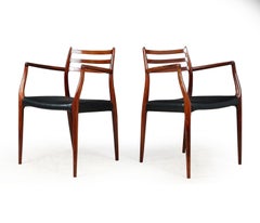 Pair of Rosewood and Leather Moller Model 62