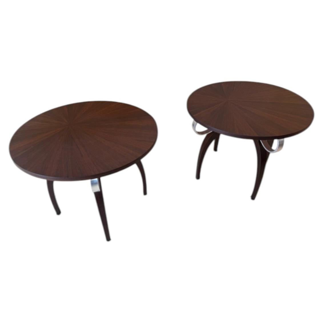 A pair of round Art Deco side tables in the style of Eugène Printz For Sale