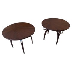 A pair of round Art Deco side tables in the style of Eugène Printz
