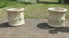 A Pair of Round Garden Planters with Winged Cherubs This is a good large pair