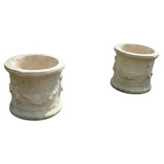 A Pair of Round Garden Planters with Winged Cherubs This is a good large pair